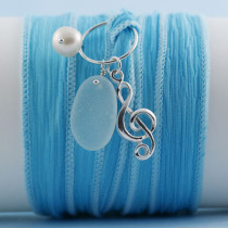 Sea Glass Bracelet, Silk Wrap in Aqua Color and Your Choice of Sterling Silver Charm. Genuine Sea Glass.