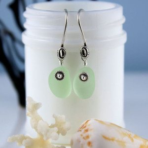 UV Green Sea Glass Earrings with Sterling Silver Ear Wires. UV Green Sea Glass Glows in the Dark. One-Of-A-Kind. Ready for fast, free shipping.