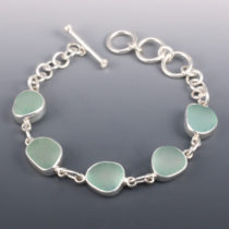 Sea Glass Bracelet Bezel Set in Sterling Silver. Five luscious sea foam green sea glass gems. Ready for Fast, Free Shipping.