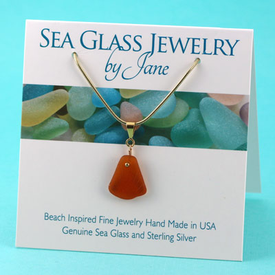 amber sea glass and silver mermaid \u2018s charm Amber sea glass and silver mermaids tail necklace orange sea glass mermaids treasure pendant