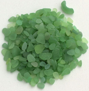 Green sea glass to be sorted by shape and size